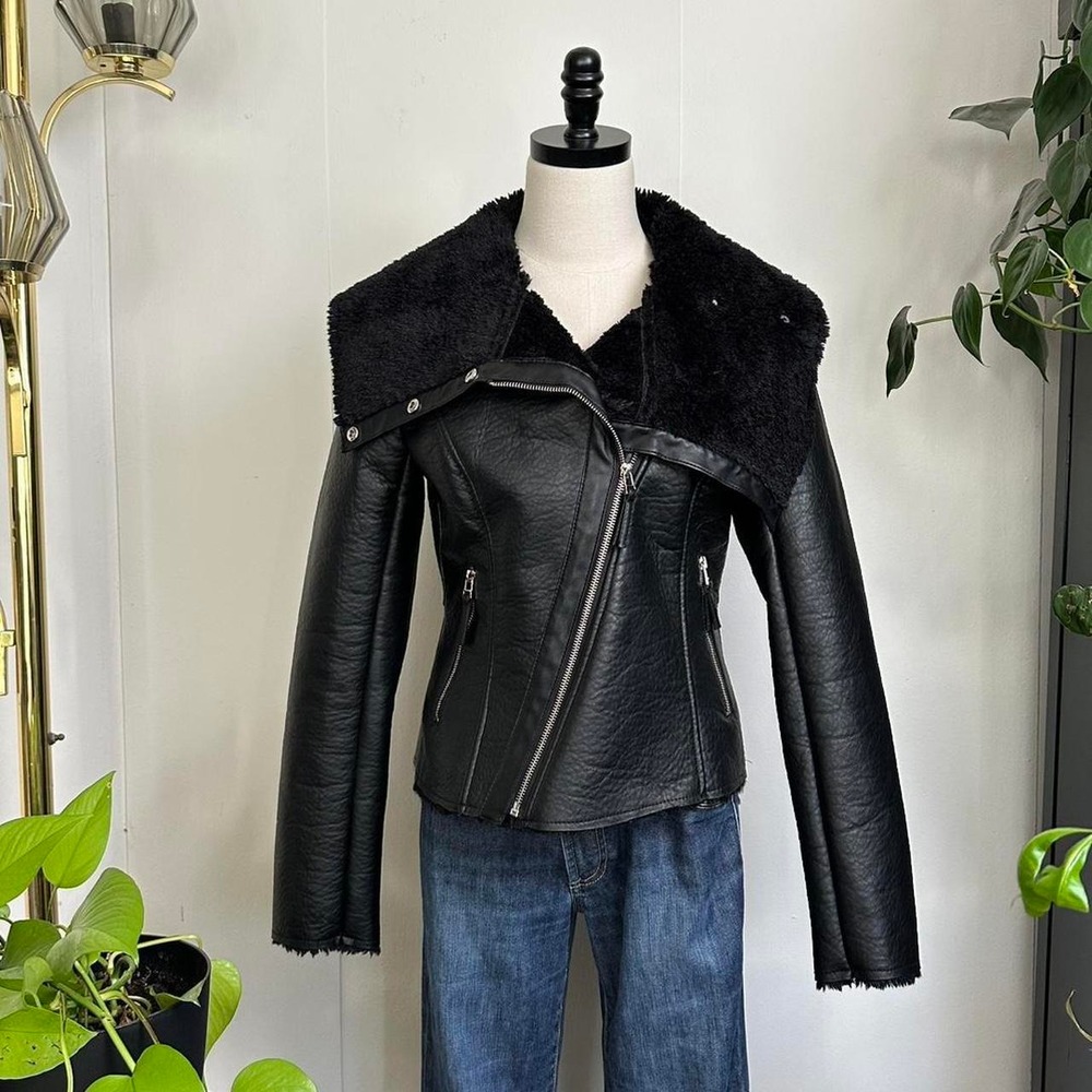 BCBG, Black faux leather jacket with dramatic fur collar and fur lined